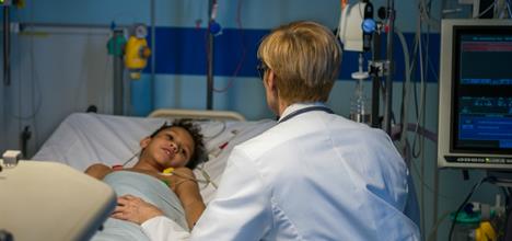 What is a pediatric critical care specialist?