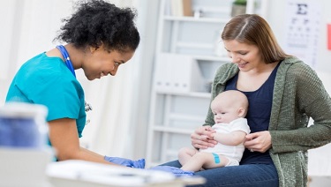 infant getting vaccinated