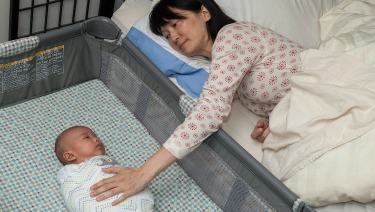 getting newborn to sleep in bassinet