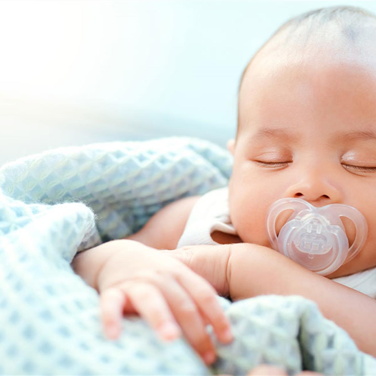 Giving Your Newborn A Pacifier: Sleep, Safety, When To Use, More