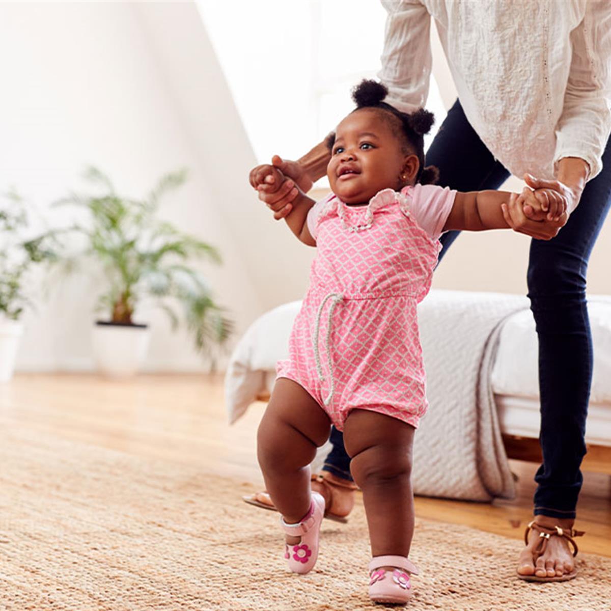 https://www.healthychildren.org/SiteCollectionImagesArticleImages/encouraging-baby-daughter-to-walk.jpg?RenditionID=6